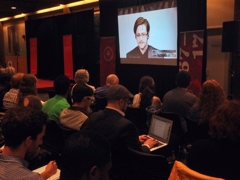 Edward Snowden speaks to students at the University of Winnipeg Tuesday night via web link. 