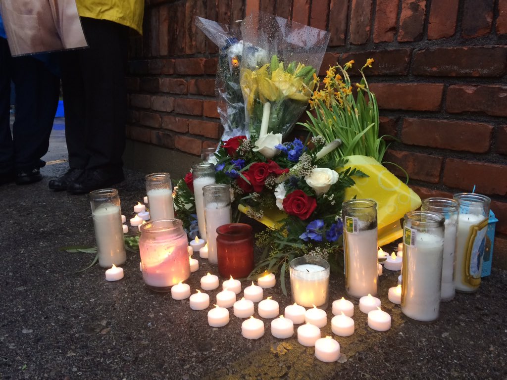 A memorial for Vijay Bhatia sits in the Mac's Milk parking lot where the cab driver was brutally assaulted by a customer.
