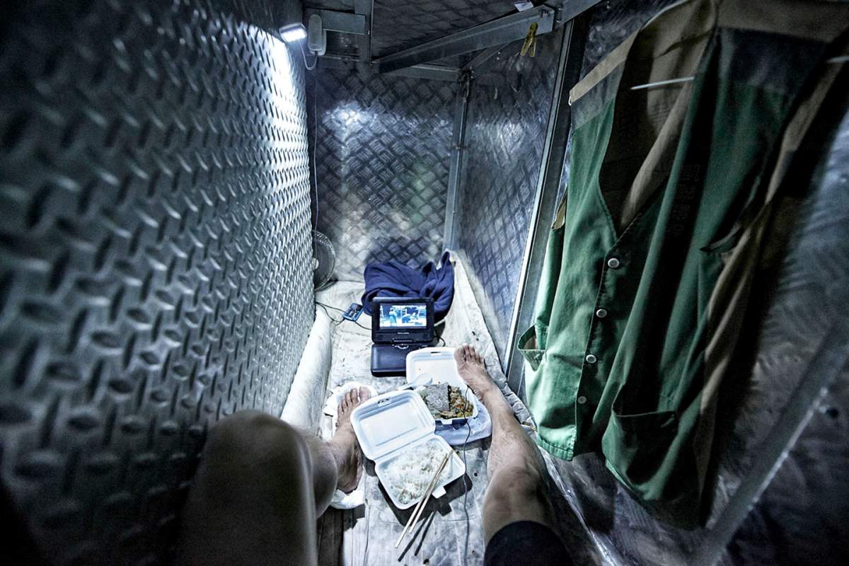 A photo by Ontario-trained photographer Benny Lam shows the cramped conditions in which low-income people live in Hong Kong.