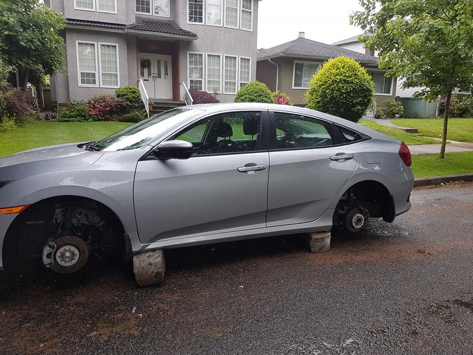2 wheels stolen from car parked in Vancouver in what police call unusual theft - image