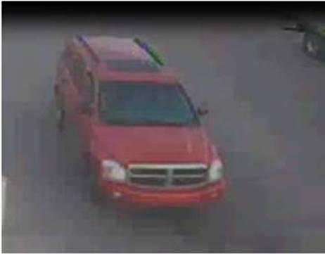 Calgary police are looking for a red Dodge Durango SLT, likely a 2004 to 2006 model, with a sunroof.