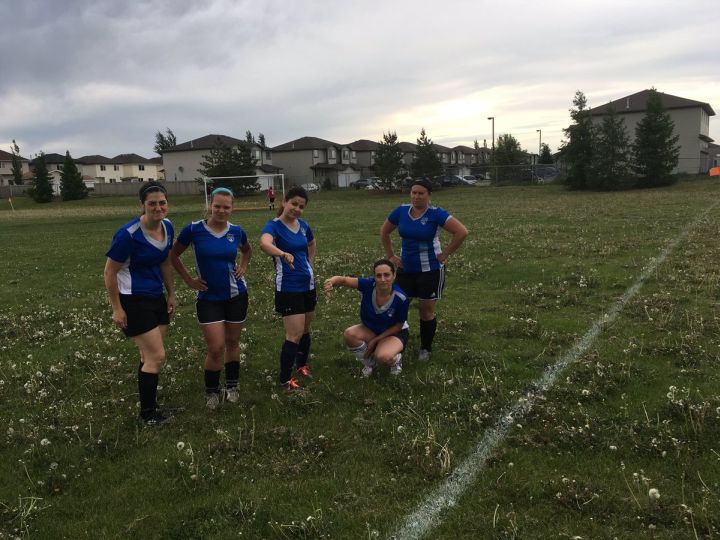 An Edmonton soccer field covered with dandelions in the area of Silver Berry Road & 32 Street.