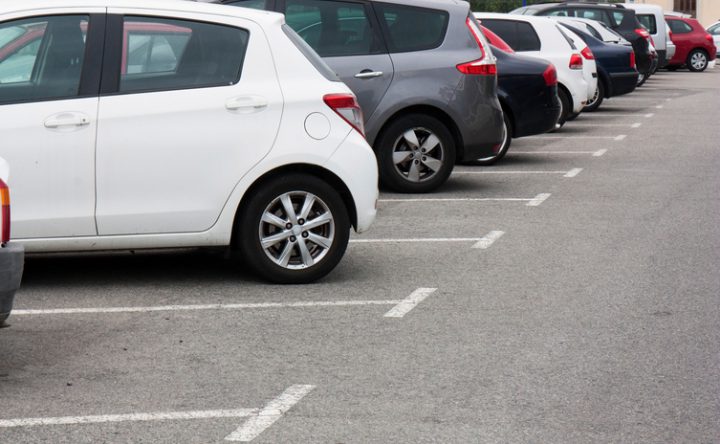 Parking lot designers need to leave plenty of space for drivers to open doors, but that may change in the future.