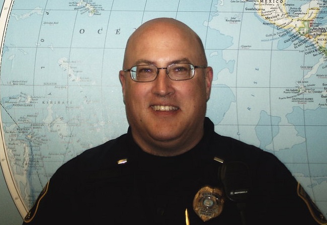 Jeff Neville has been identified as the Bishop Airport Public Safety officer who was attacked at the Michigan airport on Wednesday.