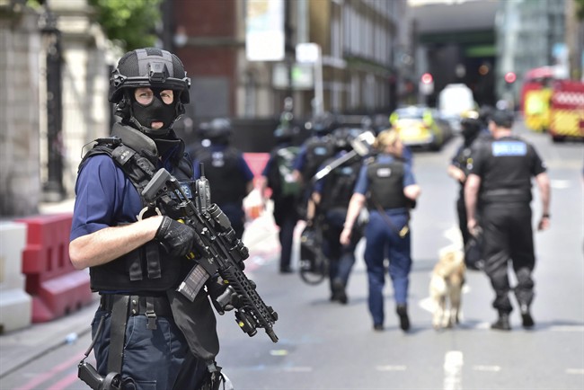 Armed police on St Thomas Street, London, Sunday June 4, 2017, .