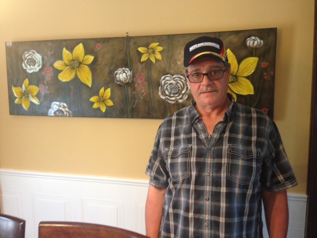 Michael Richard, who almost returned to Alberta after continuing to be denied a New Brunswick driver's licence, finally received the piece of ID on Friday.