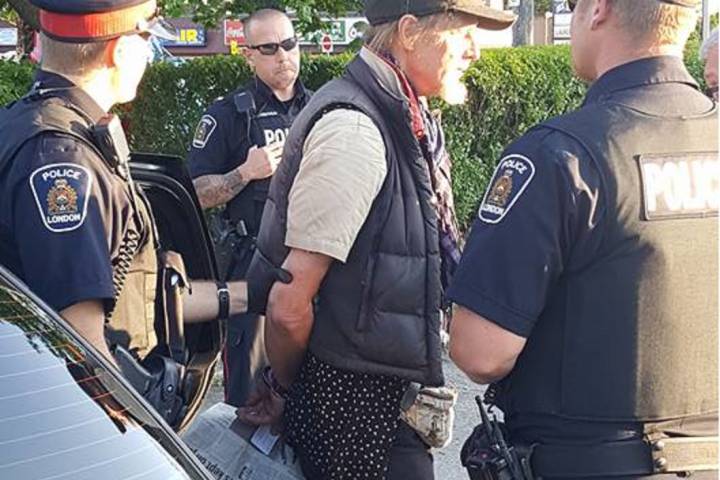 Sunny James and London Police at Huron Street and Highbury Avenue on Friday, July 14.