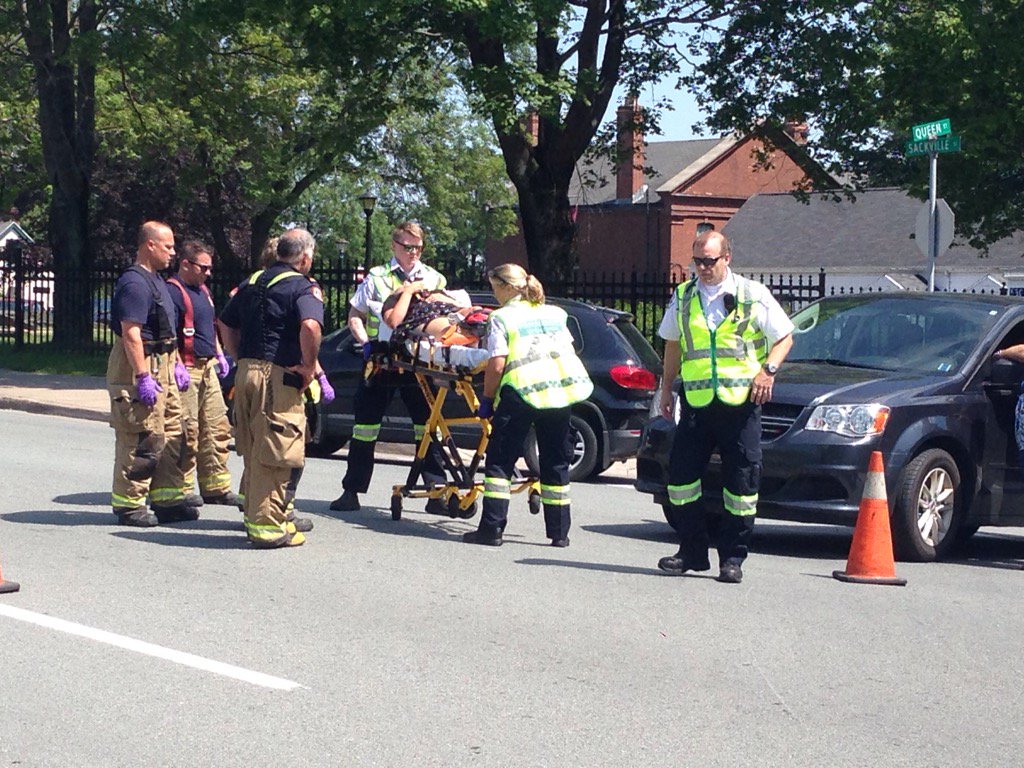 Halifax Police have issued two tickets in relation to a collision between a van and a cyclist at the intersection of Queen and Sackville.