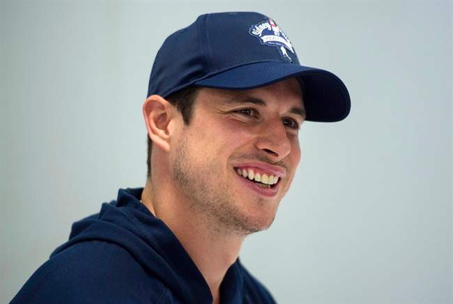 Pittsburgh Penguins' Sidney Crosby laughs while speaking to reporters during a press conference in Halifax on Wednesday, July 12, 2017.
