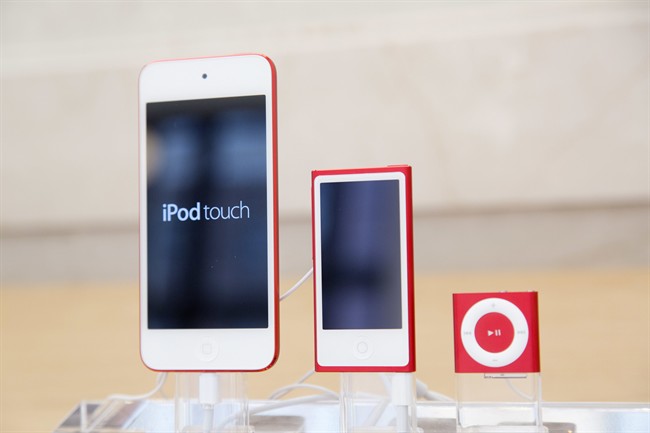  In this June 11, 2015, file photo, from left, an iPod, iPod Nano and iPod Shuffle are displayed at an Apple store in New York. 