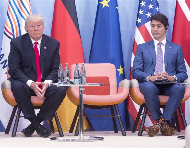 Prime Minister Justin Trudeau, right, and United States President Donald Trump take part in a Women and Development event at the G20 summit Saturday, July 8, 2017 in Hamburg, Germany.