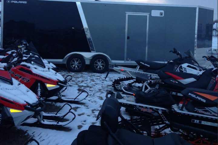 Thieves steal five snowmobiles and a trailer from a dealership south of Saskatoon.
