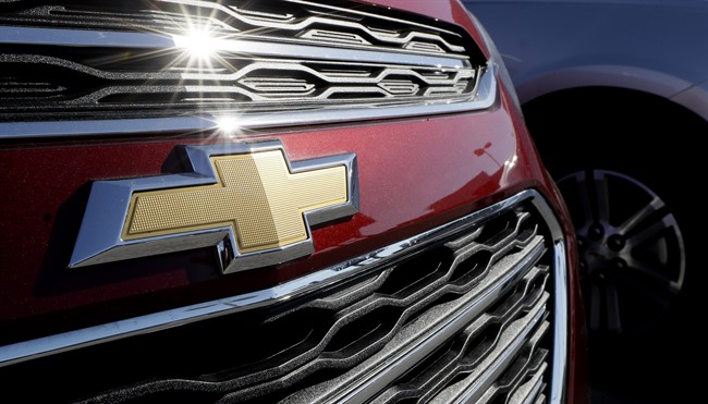In this April 25, 2017, photo, a Chevrolet truck sits in a General Motors dealer's lot in Nashville, Tenn.