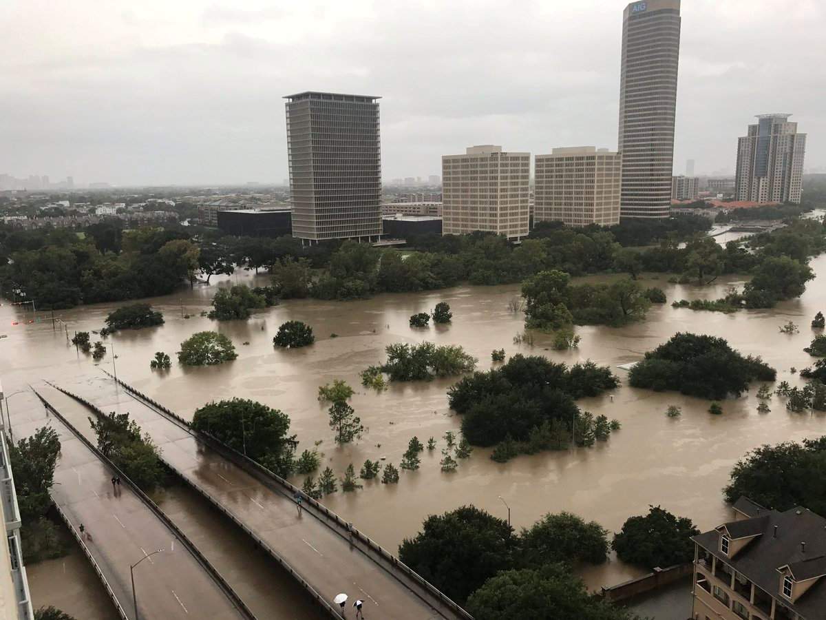Flooded downtown is seen from a high rise along Buffalo Bayou after Hurricane Harvey inundated the Texas Gulf coast with rain causing widespread flooding, in Houston, Texas, U.S. August 27, 2017 in this picture obtained from social media. (Twitter/@caroleenarn via REUTERS)