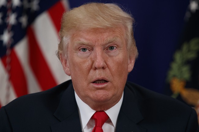President Donald Trump pauses as he speaks to reporters after a security briefing at Trump National Golf Club in Bedminster, N.J., Thursday, Aug. 10, 2017. 