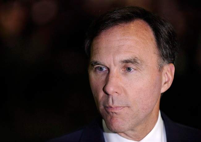 Finance Minister Bill Morneau speaks with reporters in Regina, Sask., Thursday July 27, 2017.