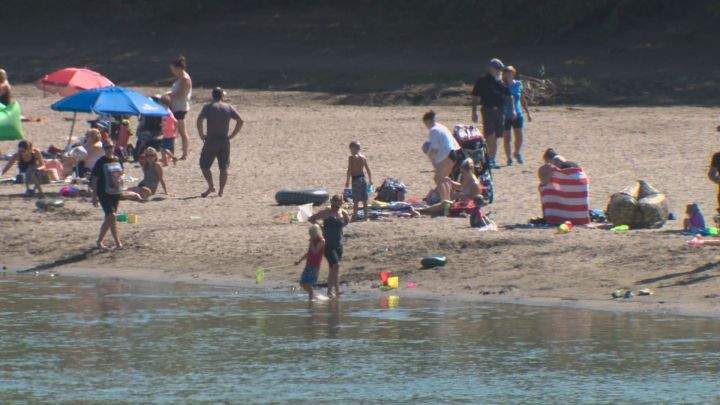 Initially, the new downtown beach on Edmonton's North Saskatchewan River prompted questions about how it got there in the first place. Now it's raising questions about how to deal with its growing number of visitors.