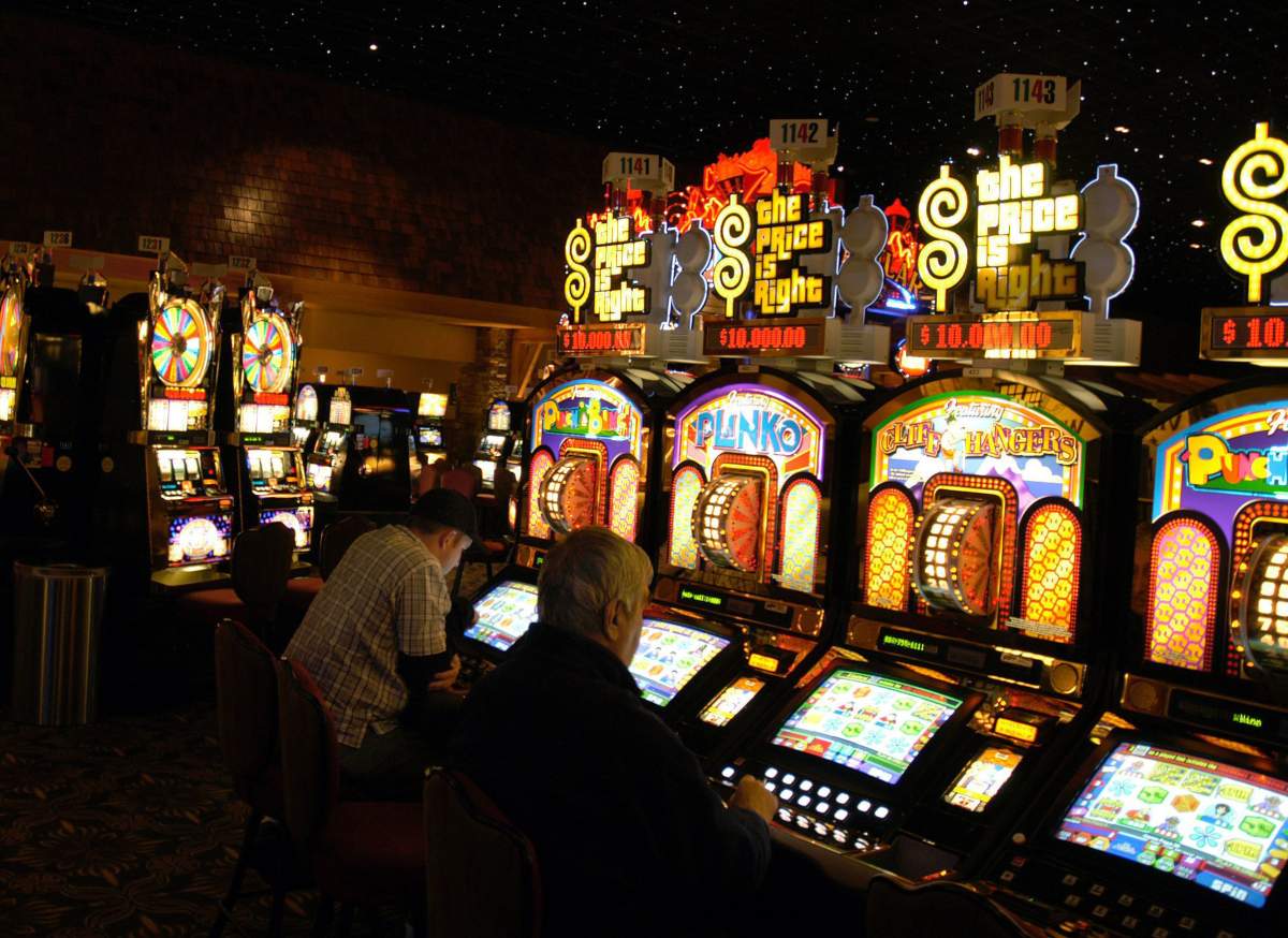 Gamblers playing slot machines at the River Rock Casino in Richmond, B.C.