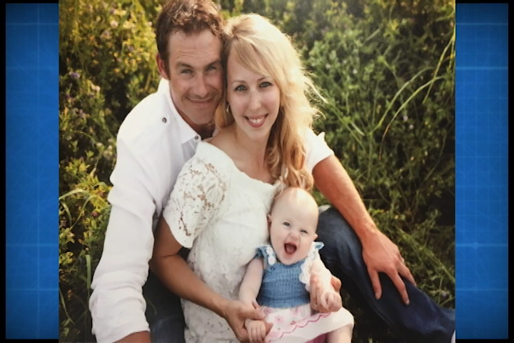 Shawn Barnett with his wife Samantha and their daughter Everleigh.