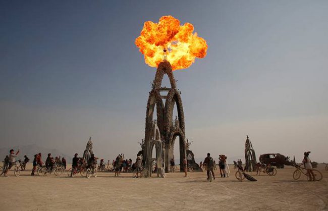 Flames shoot from the Flower Tower as approximately 70,000 people from all over the world gathered for the annual Burning Man arts and music festival in the Black Rock Desert of Nevada, August 31, 2017. 