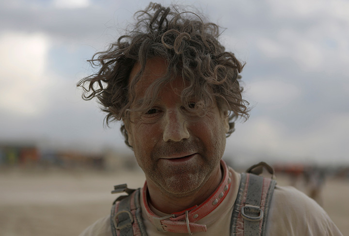 Participant David Huffman is covered by dust at the Burning Man arts and music festival in the Black Rock Desert of Nevada, August 29, 2017.