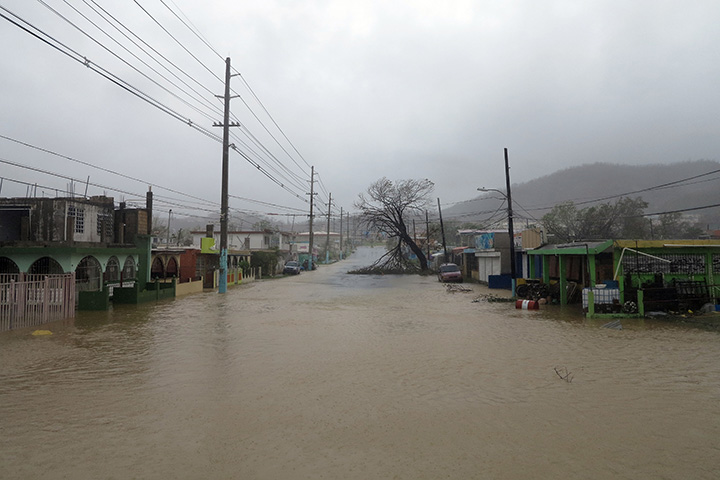 A partially flooded road is seen in Fajardo as Hurricane Maria hits Puerto Rico on September 20, 2017.