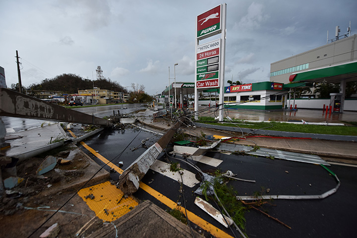 Light posts lay on the ground after the passage of Hurricane Maria, in San Juan, Puerto Rico, on September 20, 2017.