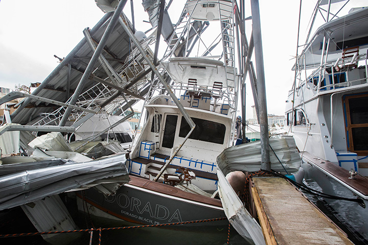 Damaged fishing boats pictured in San Juan Bay, Puerto Rico after the island was hit by Hurricane Maria, September 20, 2017.