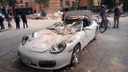 Rubble from buildings came crashing down on city streets