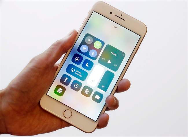 In this Sept. 15, 2017 photo, the iOS 11 control center is displayed on the iPhone 8 Plus in New York.