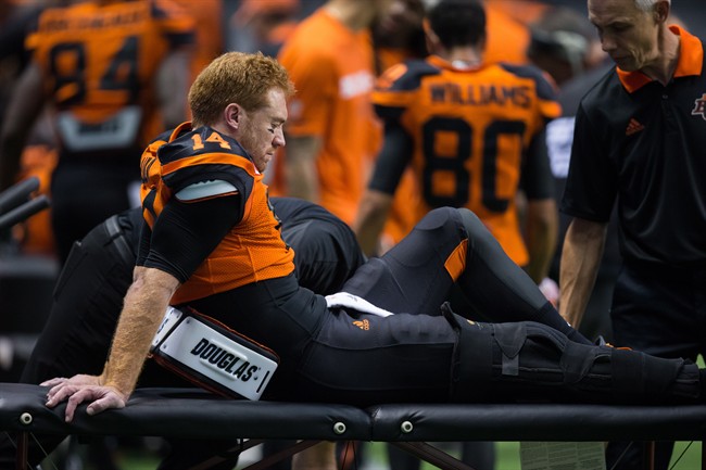 B.C. Lions’ quarterback Travis Lulay sits on the sideline after leaving the game with an injury during the first half of a CFL football game against the Montreal Alouettes in Vancouver, B.C., on Friday September 8, 2017.