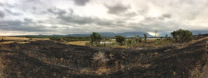 A panoramic shot from a lookout about 6 km from the Waterton village turnoff, showing a first look at Waterton since the wildfire burned through. Sept. 13, 2017.