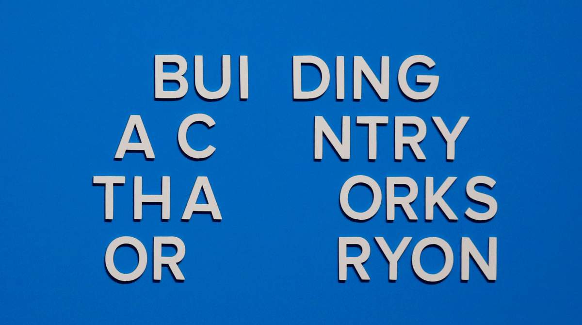 The wording on a slogan is changed after letters fell away from the backdrop immediately after Britain’s Prime Minister Theresa May concluded her address to the Conservative Party conference in Manchester, October 4, 2017.