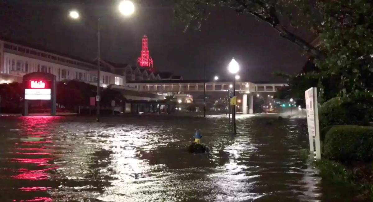 A flooded street is seen in Mobile, Ala., on Oct. 8, in this still image taken from a video obtained from social media.