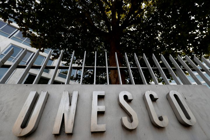 The logo of the United Nations Educational, Scientific and Cultural Organization (UNESCO) is seen in front of its headquarters in Paris, France, Oct. 4, 2017.
