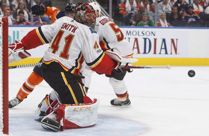 Calgary Flames goalie Mike Smith (41) makes the save against the Edmonton Oilers during second period NHL action in Edmonton, Alta., on Wednesday October 4, 2017.