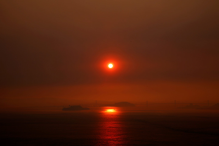 A view of San Francisco as smoke from wildfires in Santa Rosa and Napa Valley covers the sun on October 10, 2017.