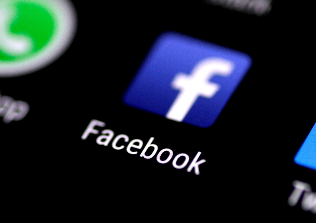 The Facebook application is seen on a phone screen August 3, 2017.  