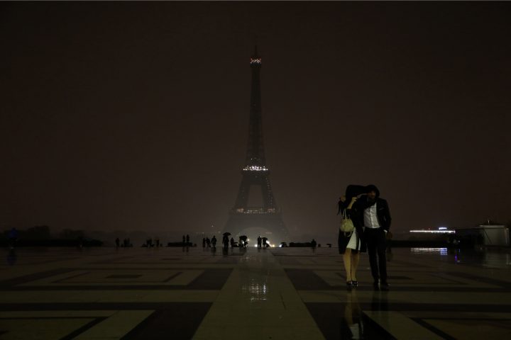 The lights of the Eiffel Tower in Paris are switched off on Oct. 2, 2017 in tribute to the victims of the attacks in Las Vegas and Marseille.