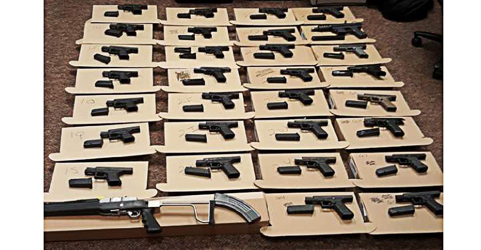 A man was charged with over 330 charges in September after Durham police seized 33 guns and other prohibited devices from a Pickering home.