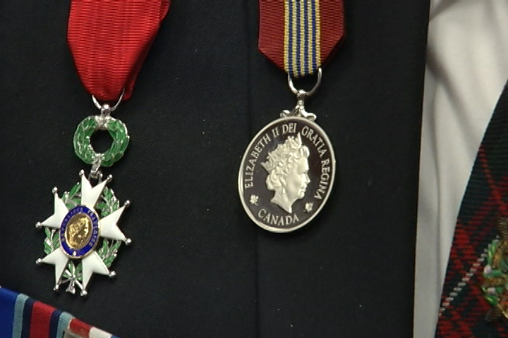 The Sovereign’s Medal for Volunteers (right).