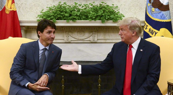 Justin Trudeau meets with Donald Trump in the Oval Office of the White House on Oct. 11, 2017. The two leaders are currently sparring over new tariffs announced by the U.S.