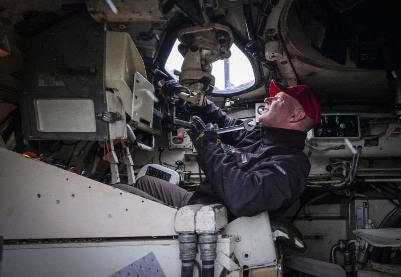 Canadian Forces veteran John Senior works on de-commissioned armoured vehicle as therapy to deal with PTSD at the Military Museums in Calgary, Alta., Wednesday, Oct. 11, 2017.