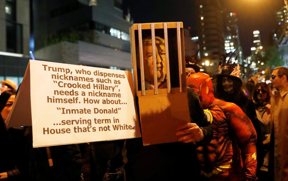 People are dressed in costumes for the New York City Halloween parade in New York City, NY, U.S., October 31, 2017.