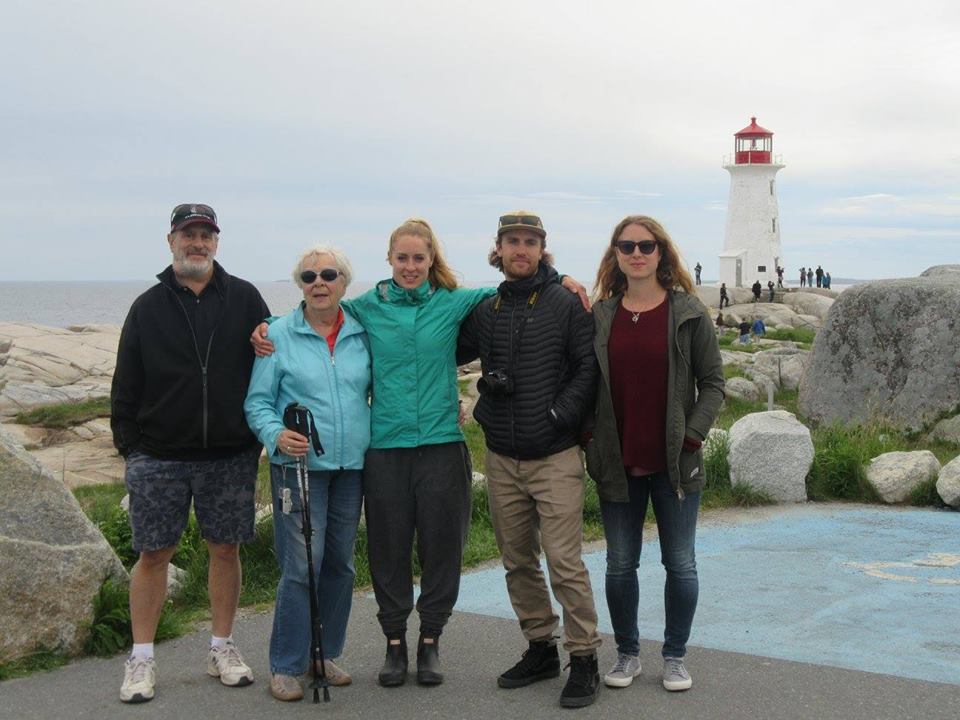 Wyatt Evans, his mother and children pose for a photo at Peggy's Cove. The family's missing Nikon camera can be seen around his son's neck.
