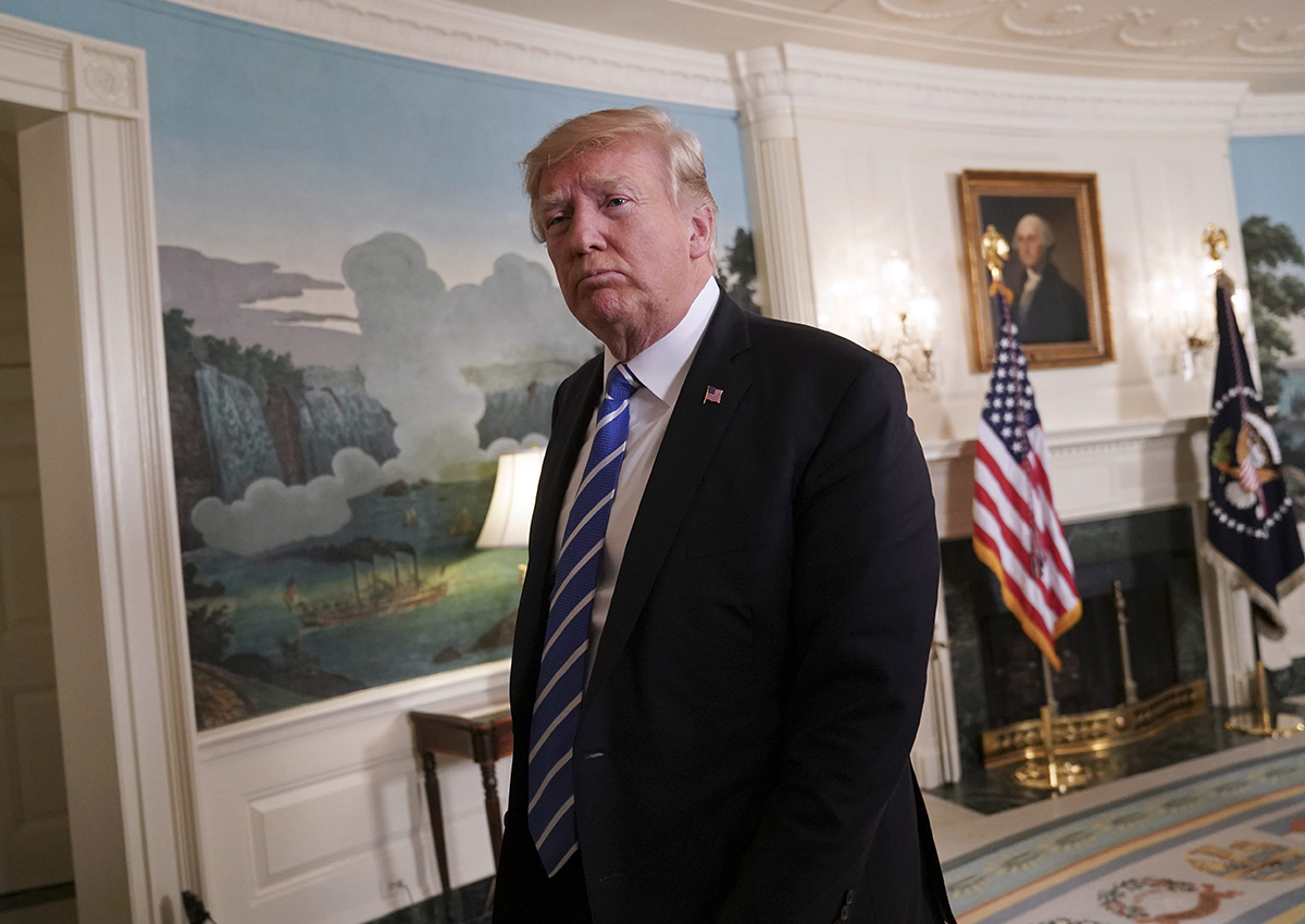 In this Wednesday, Nov. 15, 2017 file photo, President Donald Trump walks away from the podium after speaking in the Diplomatic Reception Room of the White House, in Washington. 