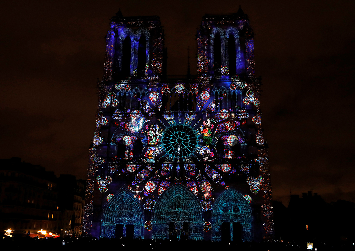 Notre-Dame de Paris Cathedral is illuminated in Paris on November 11, 2017, during a light show as part of the Armistice Day commemorations marking the end of WWI (World War One).
