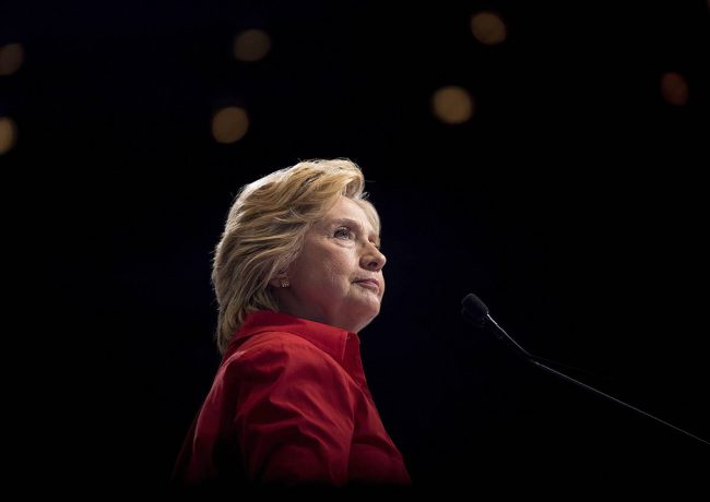  In this Saturday, July 30, 2016 file photo, Democratic presidential candidate Hillary Clinton pauses while speaking at a rally in Pittsburgh during a bus tour through the rust belt.