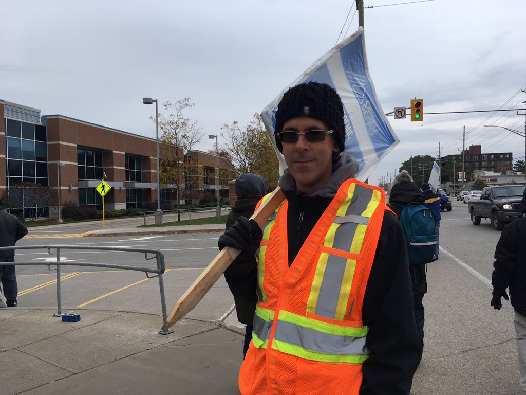 Jeff Miles, a teacher at Fanshawe College, walks the picketlines at Fanshawe College on Nov. 1, 2017.