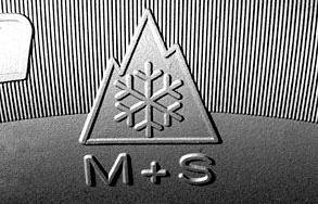 The mountain snowflake symbol indicates a winter tire meets the minimum requirements for providing traction in harsh conditions.